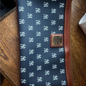 Dooney & Bourke Navy and White New York Yankees Logo Wristlet